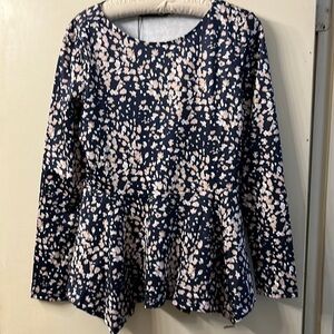 NWT peplum shirt size small with log sleeves and round neck.